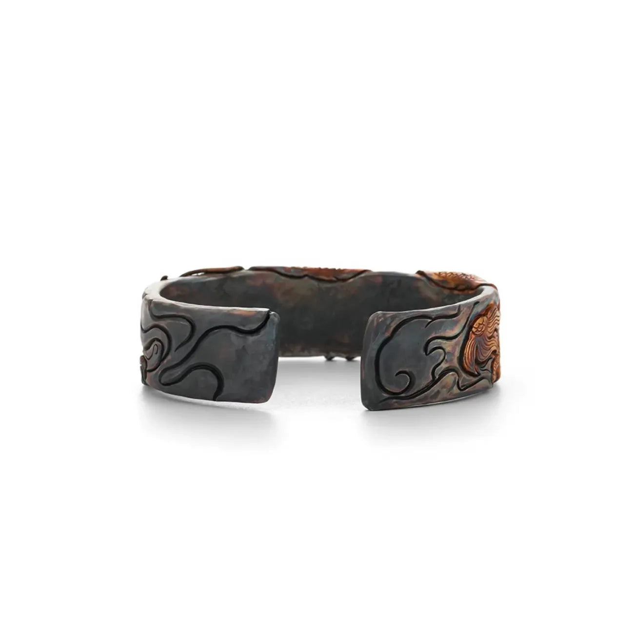 Back view showing the open-cuff design and the dark oxidized matte finish of the silver interior