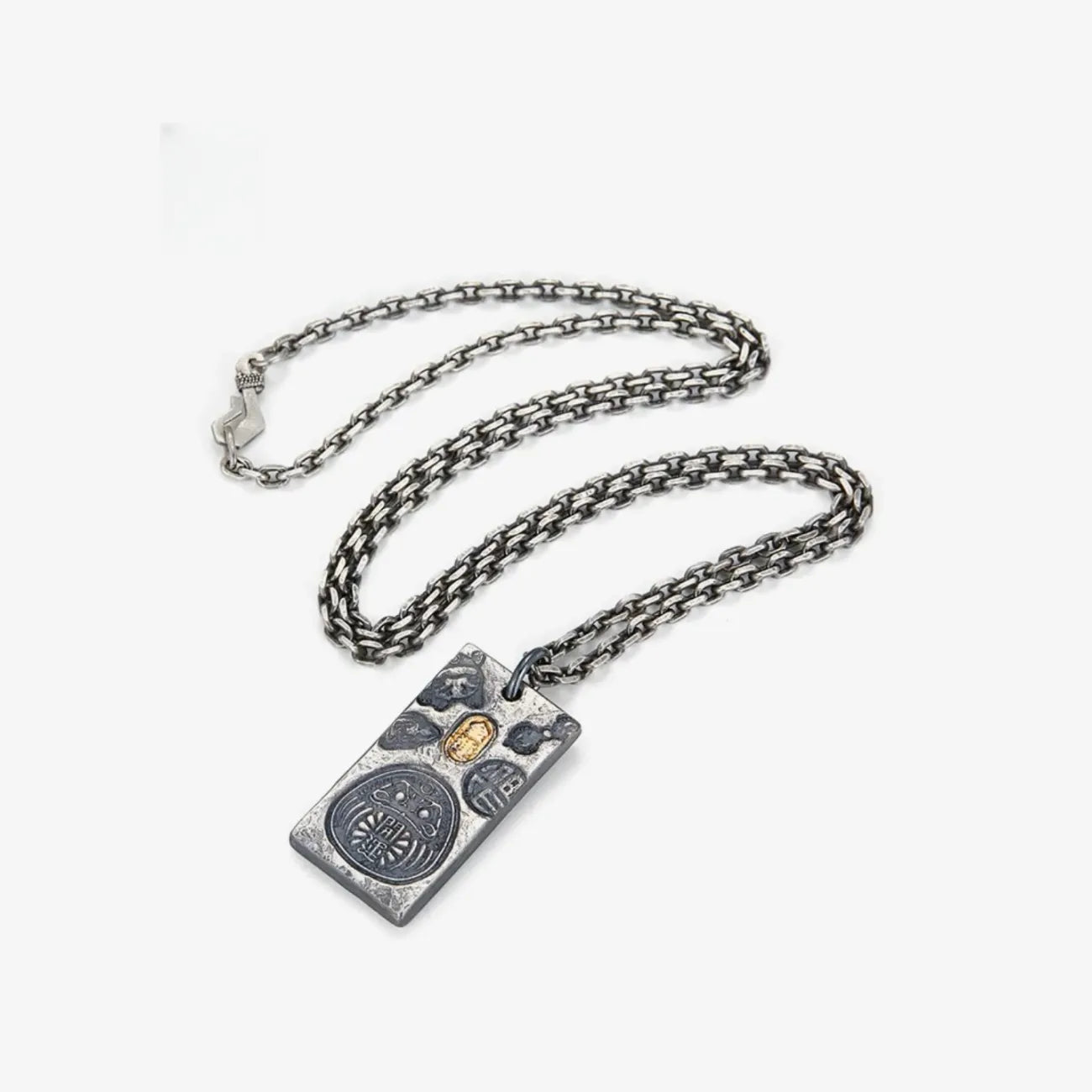 Flat lay of the antique silver chain paired with the rectangular Fortune Key pendant