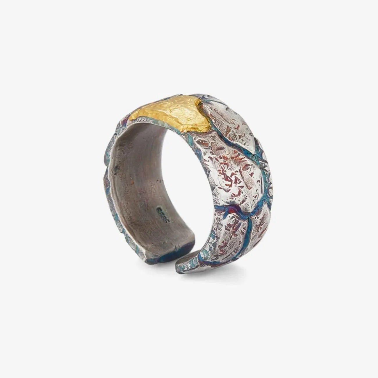 Top-down view of the Bedrock Ring highlighting the wabi-sabi lava rock aesthetic and heavy metal weight