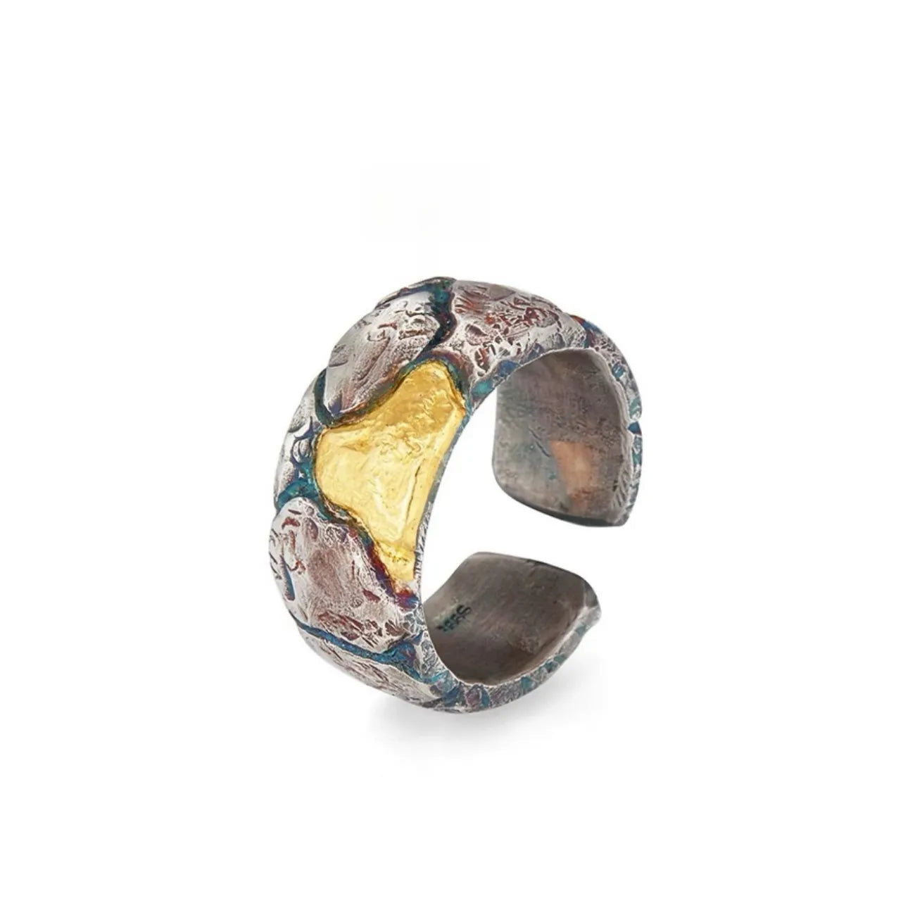 Side profile of the Bedrock Ring showing the brutalist reticulated silver craftsmanship with bluing and rufous details