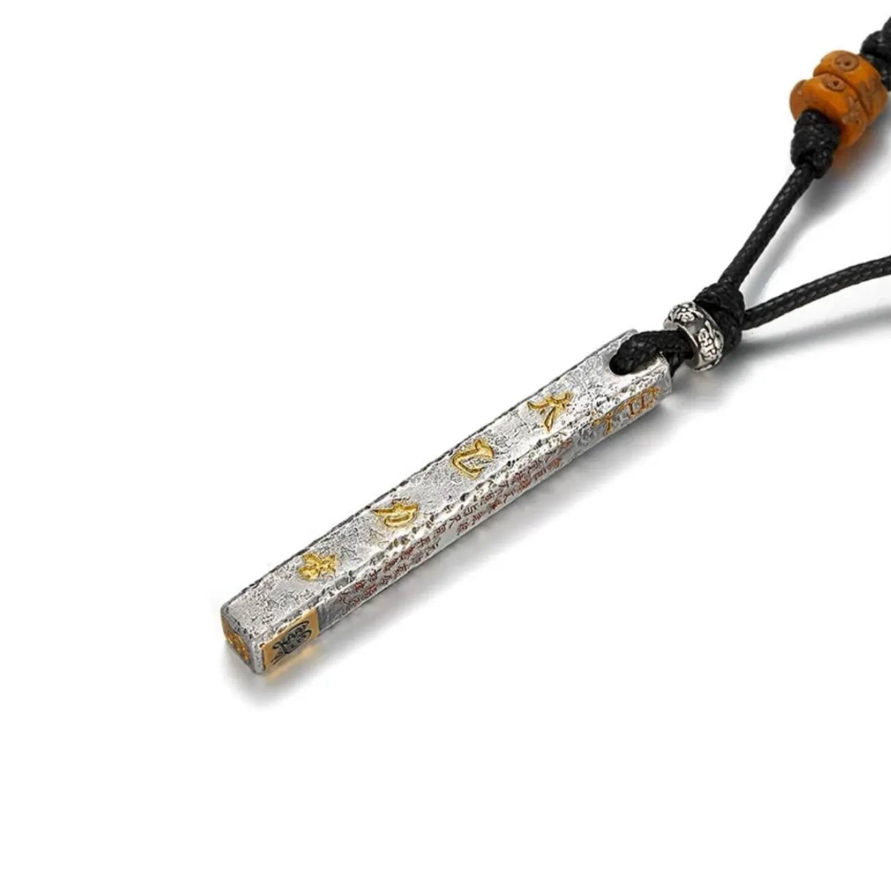 Angled view of the silver pillar pendant engraved with the names of the Big Dipper seven stars in gold