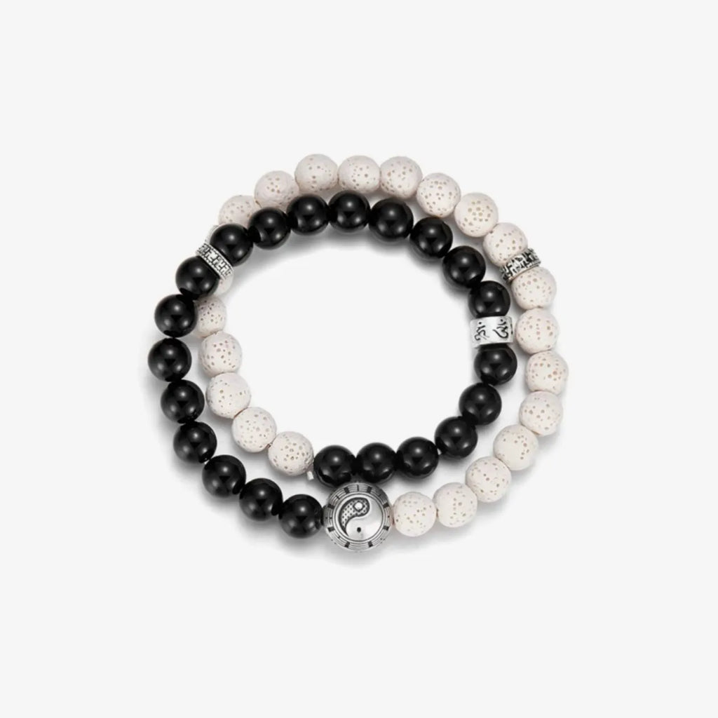 Top-down view of the contrasting black and white beads, symbolizing balance and harmony in duality