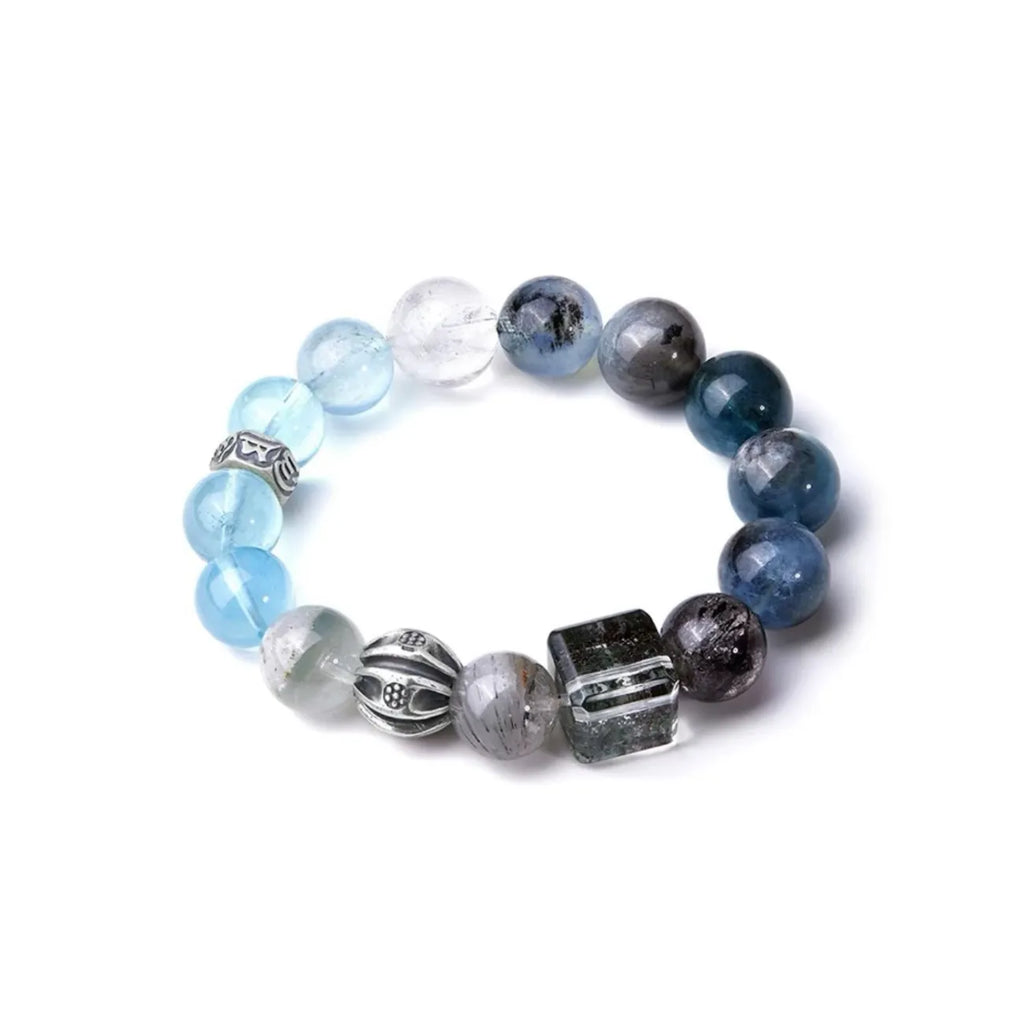 Side profile showing the smooth color transition from icy aquamarine to deep blue kyanite and grey quartz