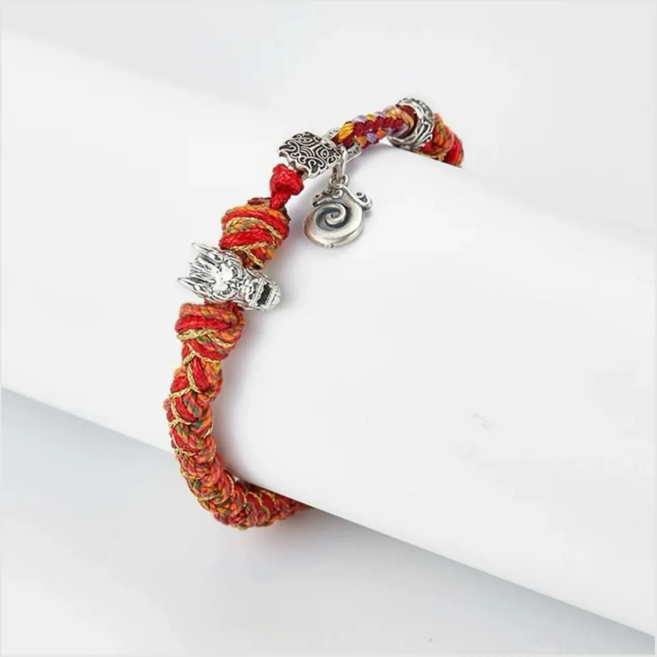 Back view highlighting the adjustable closure and silver spiral tag on this Feng Shui protection bracelet