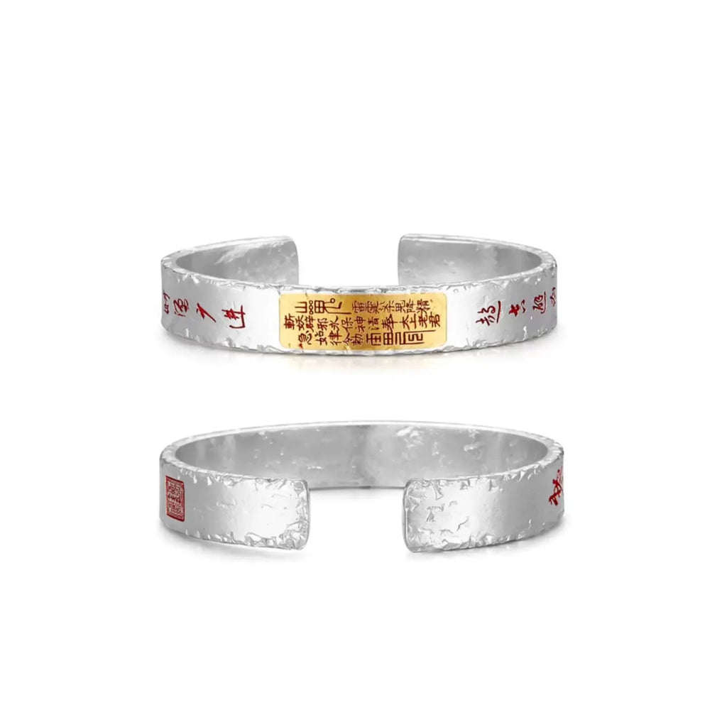 Back view of the bangle, displaying the continuous silver texture and the interior smoothness for comfortable wear