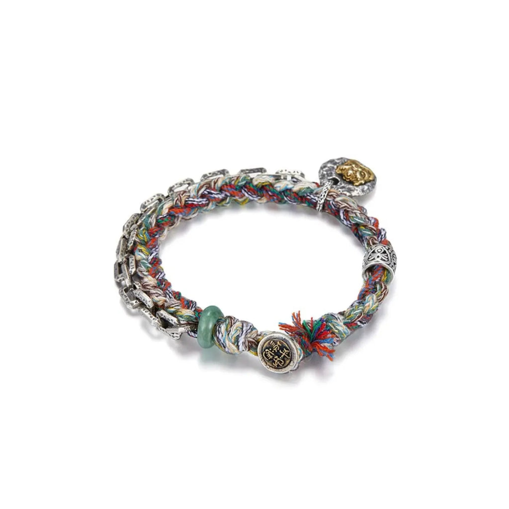 Back view displaying the dangling ancient coin charm engraved with lucky characters, symbolizing wealth and safety