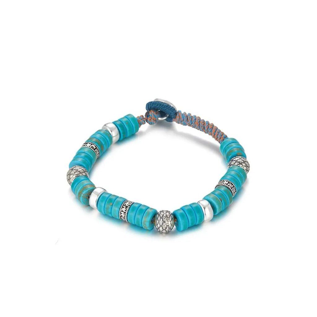 Side profile highlighting the intricate geometric patterns on the silver beads, adding a vintage Tibetan touch