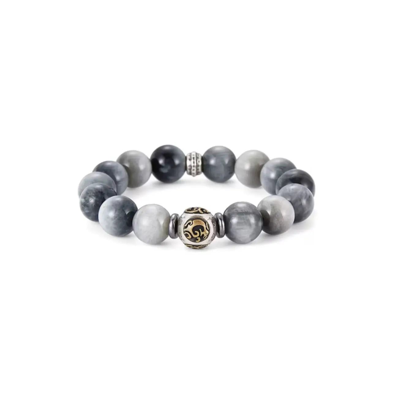 Front view of the bracelet featuring chatoyant grey eagle eye stones and a central vintage silver bead with gold inlay