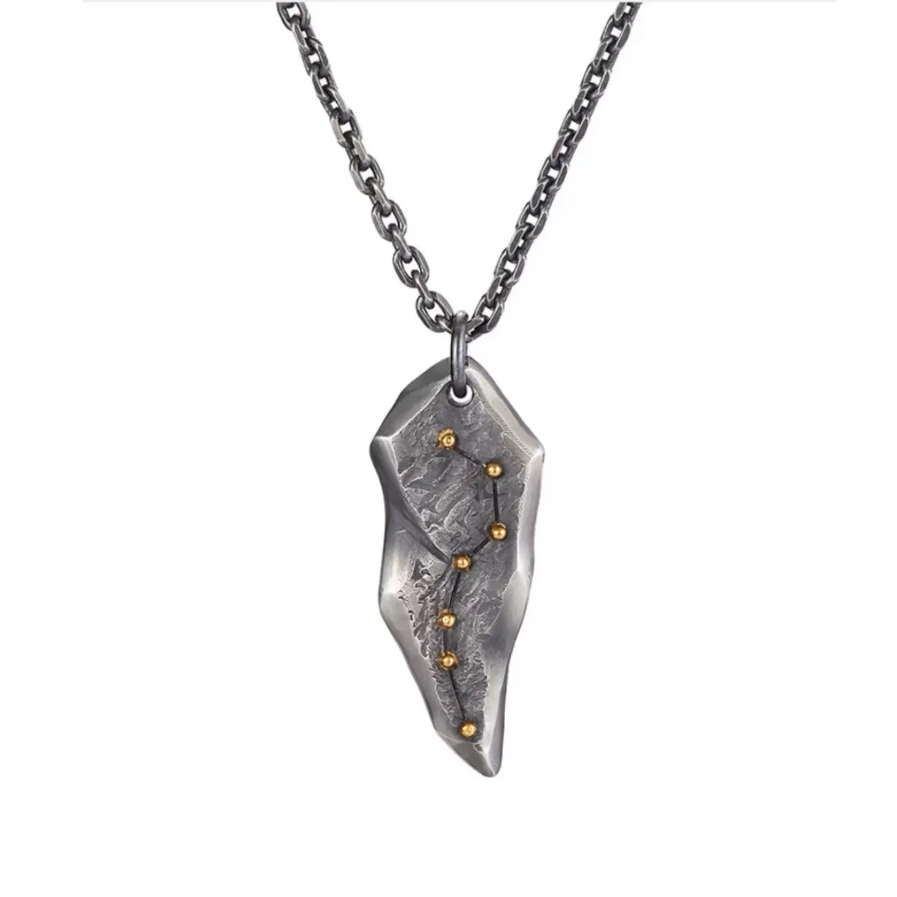 Front view of the irregular silver pendant featuring the Big Dipper constellation inlaid with gold dots