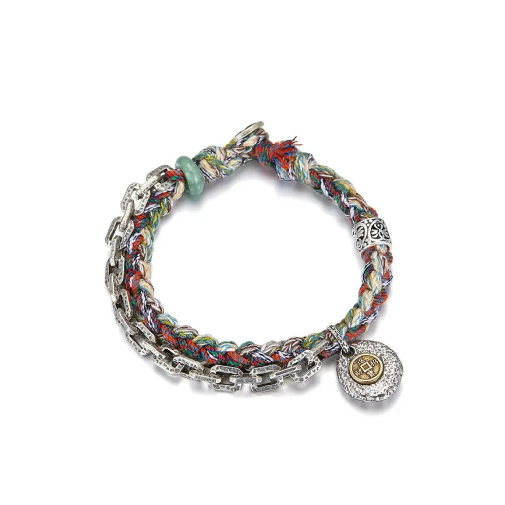 Side profile showing the rugged texture of the industrial-style silver chain links contrasted against the soft, traditional five-color rope