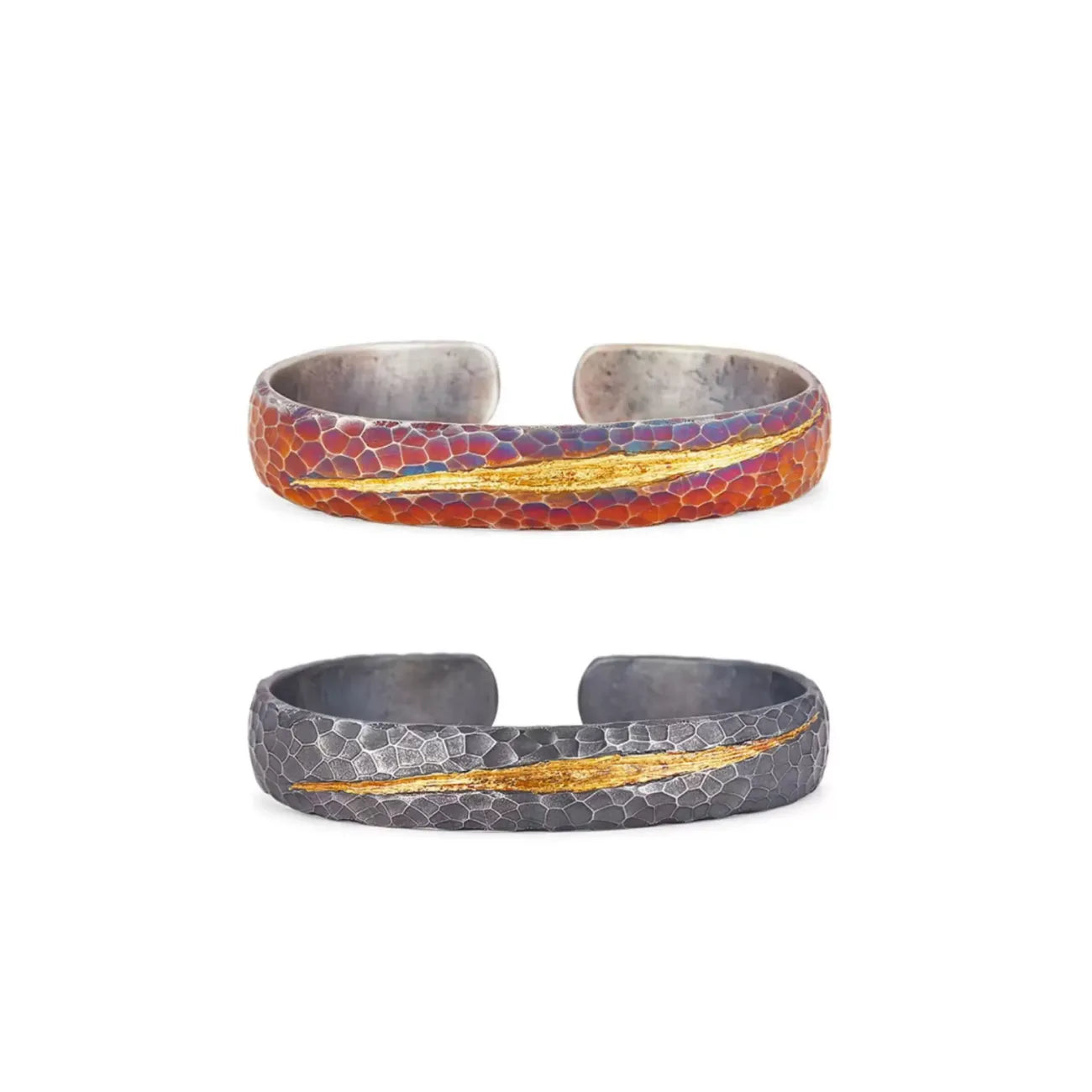 Front view of two Understated Bangles, showcasing the contrast between the reddish rufous and dark bronze oxidized finishes, both featuring a gold fused line