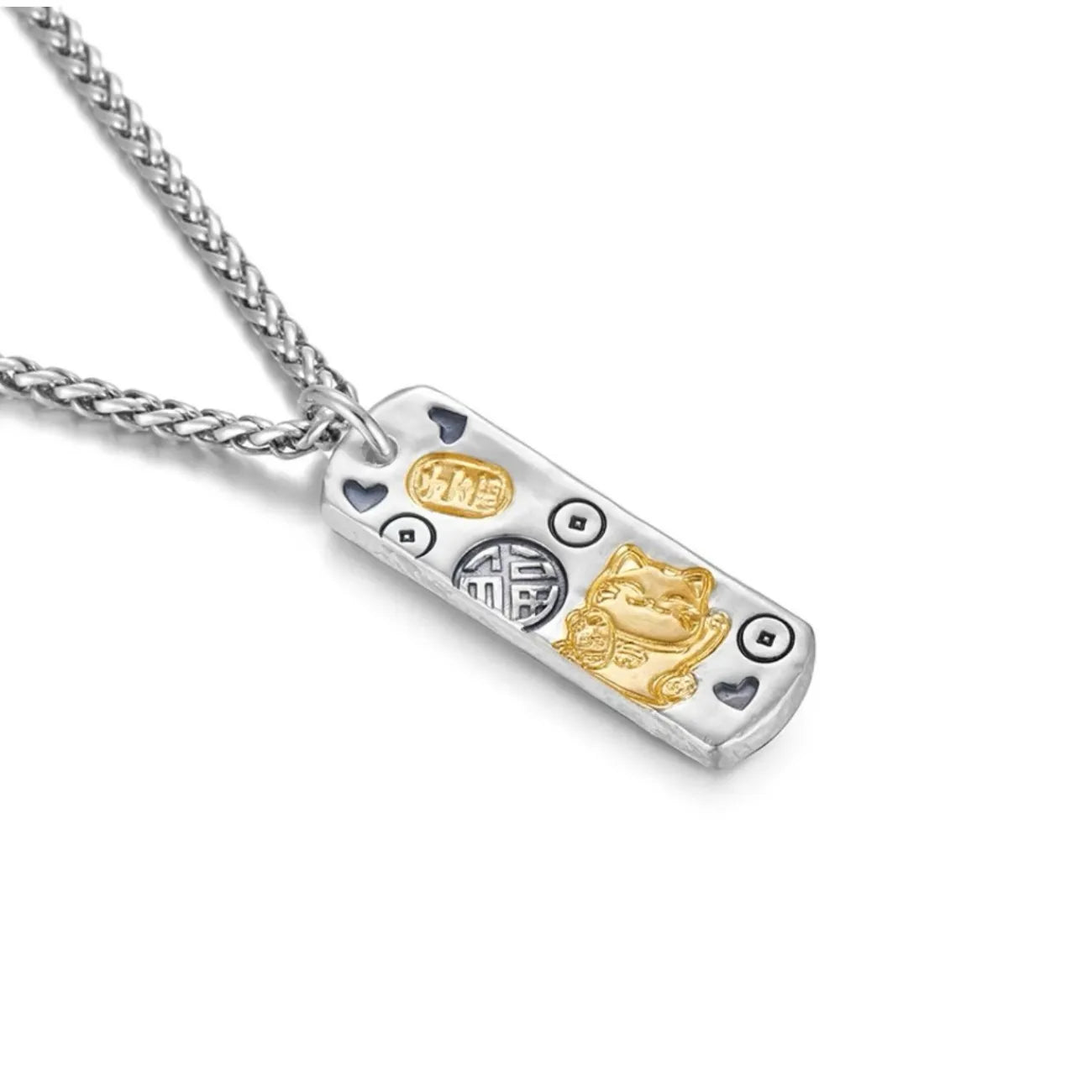 Angled side view of the lucky cat pendant highlighting the silver and gold contrast and relief details