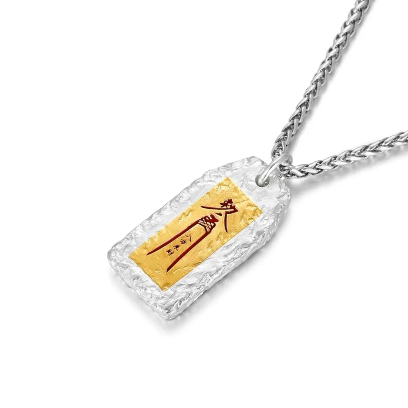 Side profile of the handcrafted amulet necklace showing the thick hammered silver edge and solid construction