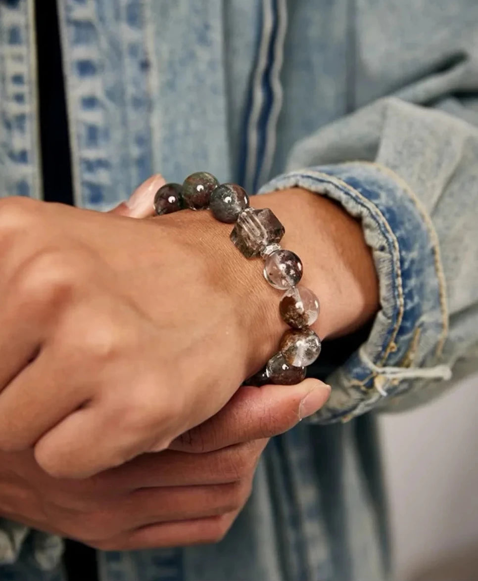 Natural interaction shot displaying the warm earth tones of the quartz, perfect for grounding and meditation