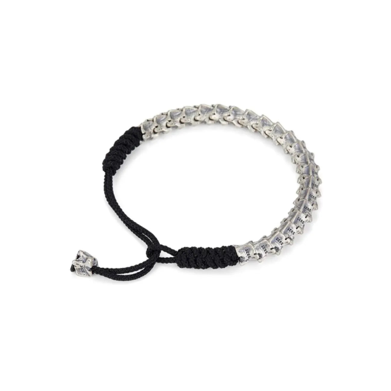 Back view focusing on the adjustable black cotton macrame knot and the small silver bone tail charm