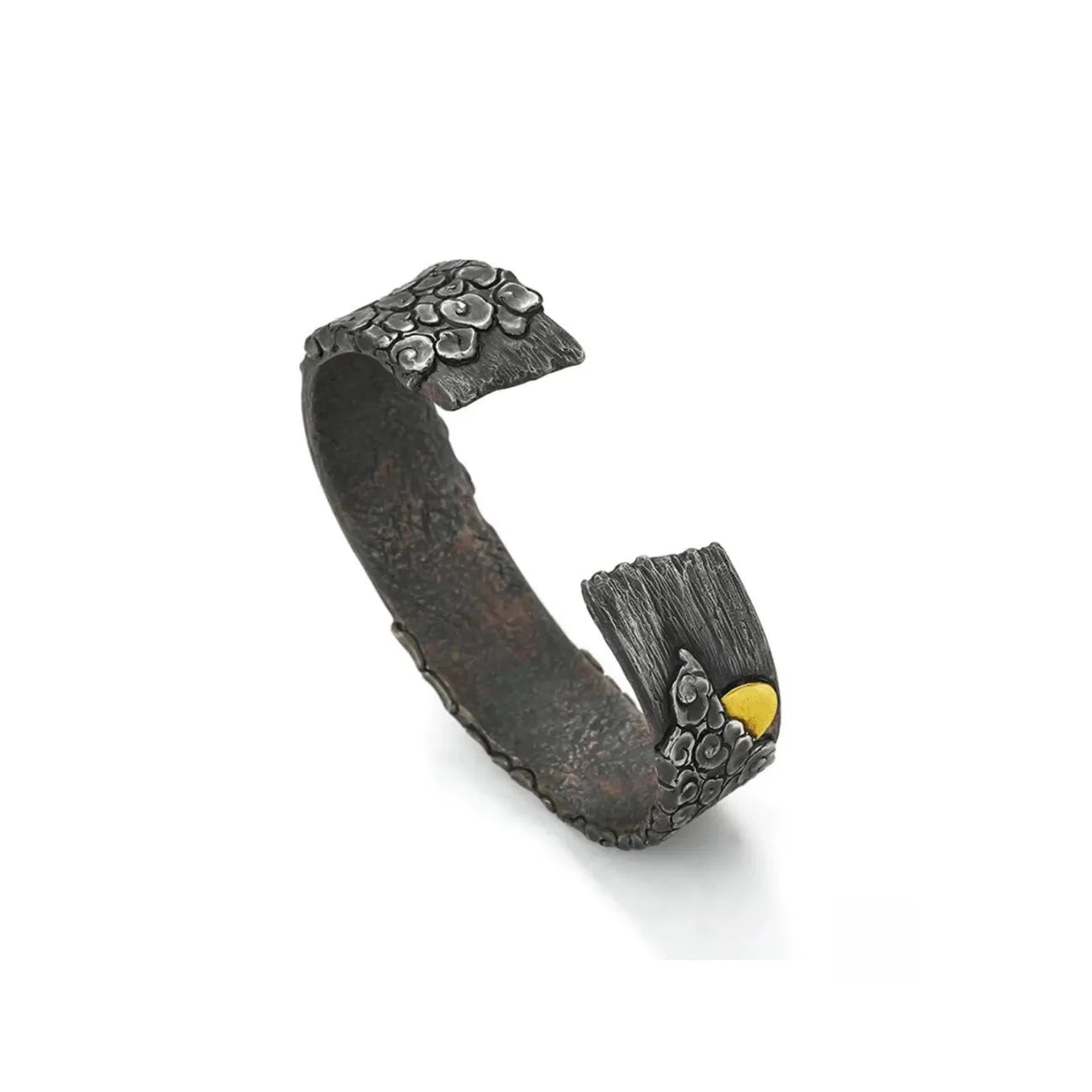 Back view of the open cuff design, highlighting the matte charcoal finish and the solid weight of the silver