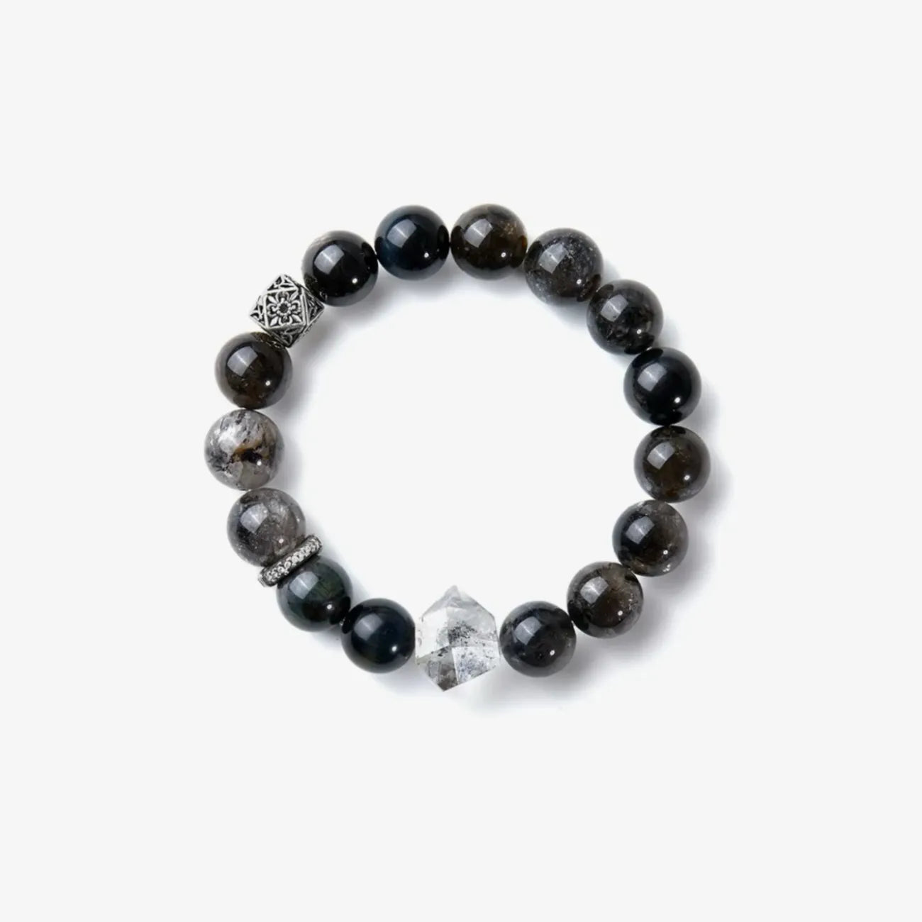 Top-down view displaying the full arrangement of blue tiger eye beads and silver accents on a white background