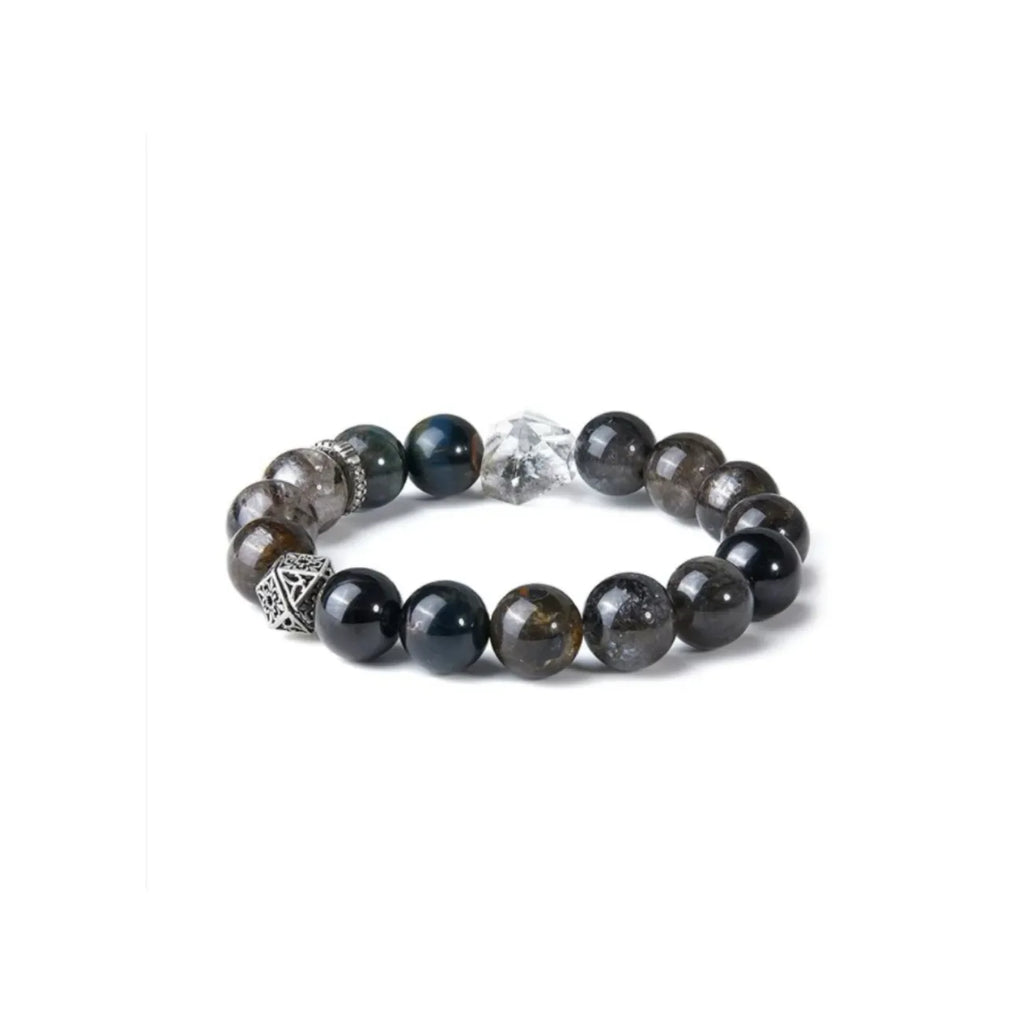 Back view highlighting the intricate hollow silver geometric bead and spacer ring integrated into the black stone bracelet