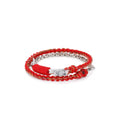 Front view of the "Serpent" bracelet, combining a lucky red cotton cord with a sterling silver curb chain