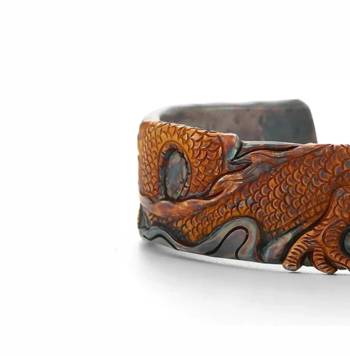 Top-down view highlighting the unique color gradient from dark silver to burnt rufous bronze