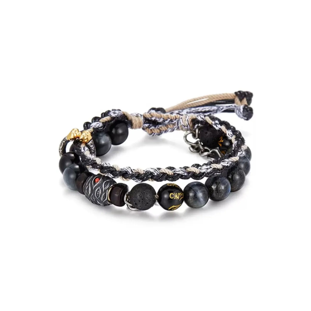 Front view of the Wukong bracelet, featuring a silver Monkey King charm, blue tiger eye beads, and a layered rope chain design