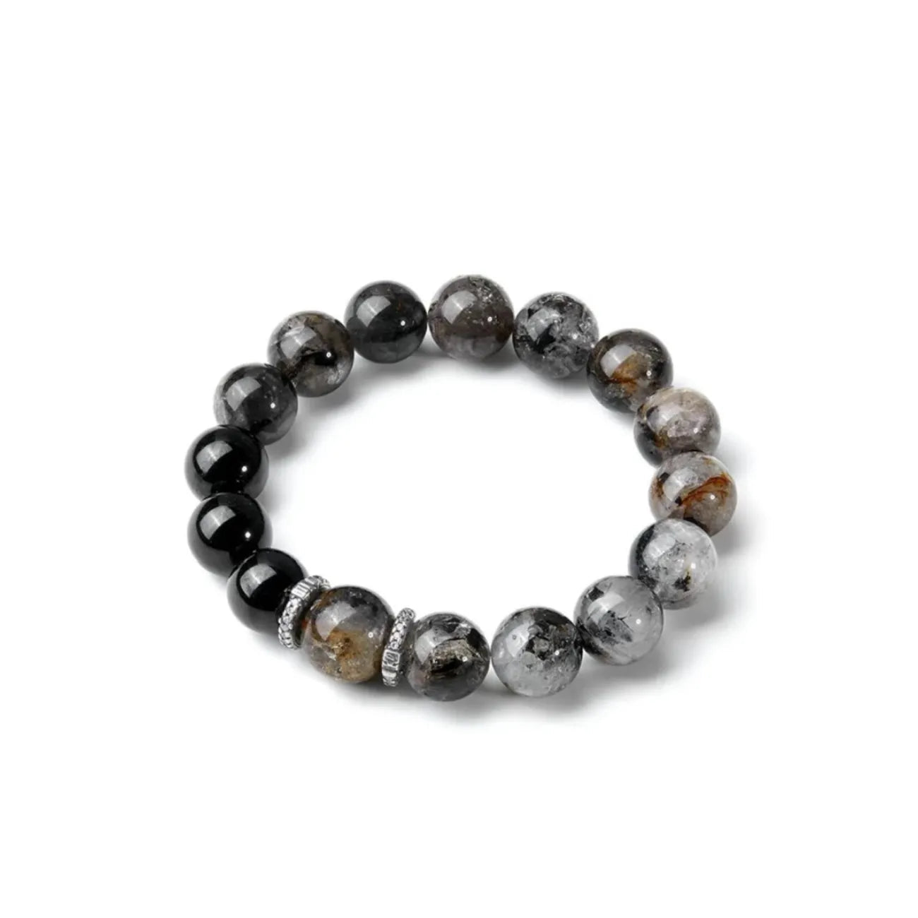 Side profile focusing on the central brown rutilated quartz bead flanked by textured silver spacers for a rugged look
