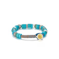 Front view of the Blessing Bracelet, featuring vibrant turquoise heishi disc beads interspersed with textured silver spacers
