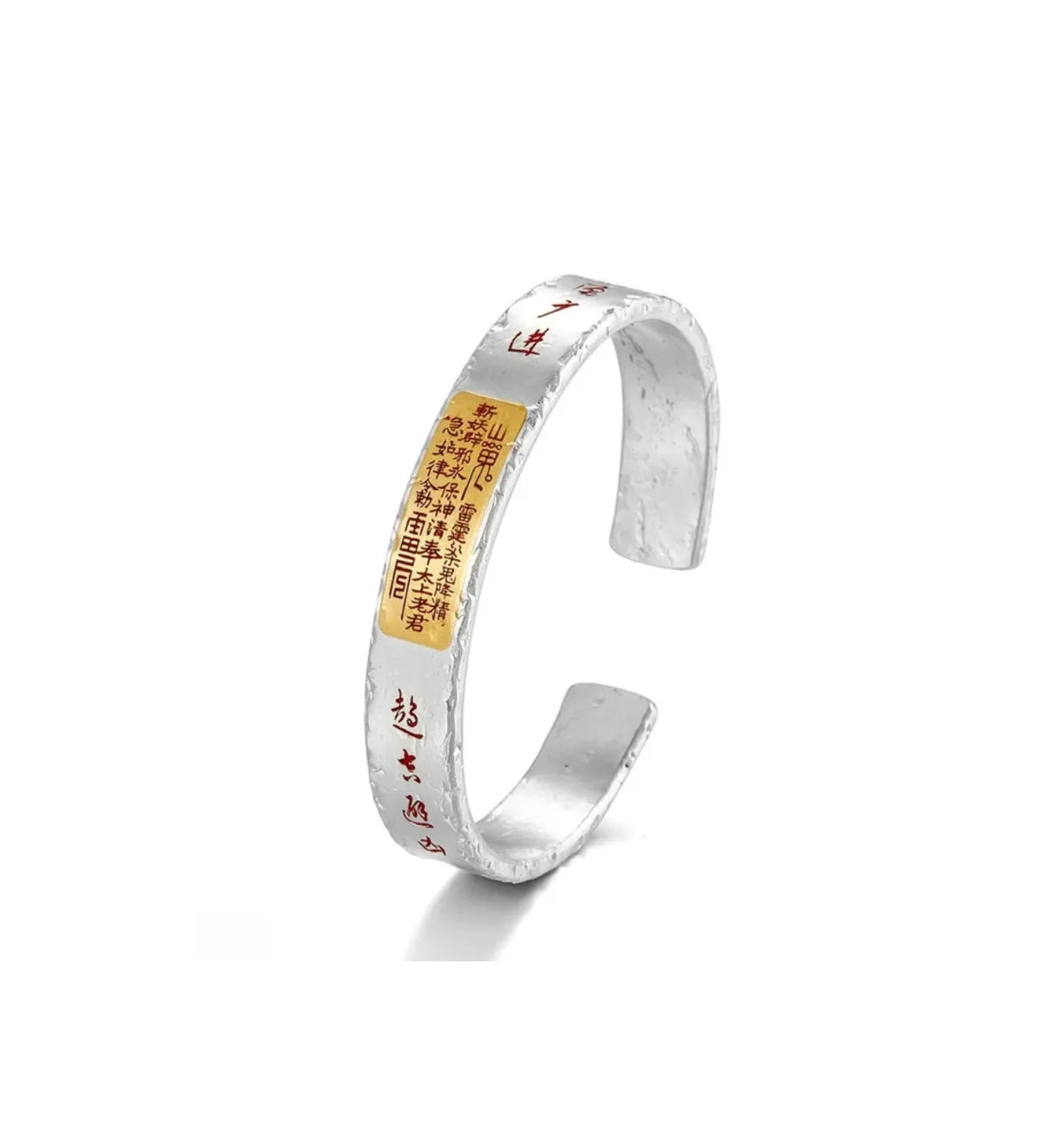 Front view of a silver bangle featuring a gold Taoist talisman patch and vermilion red scripture characters