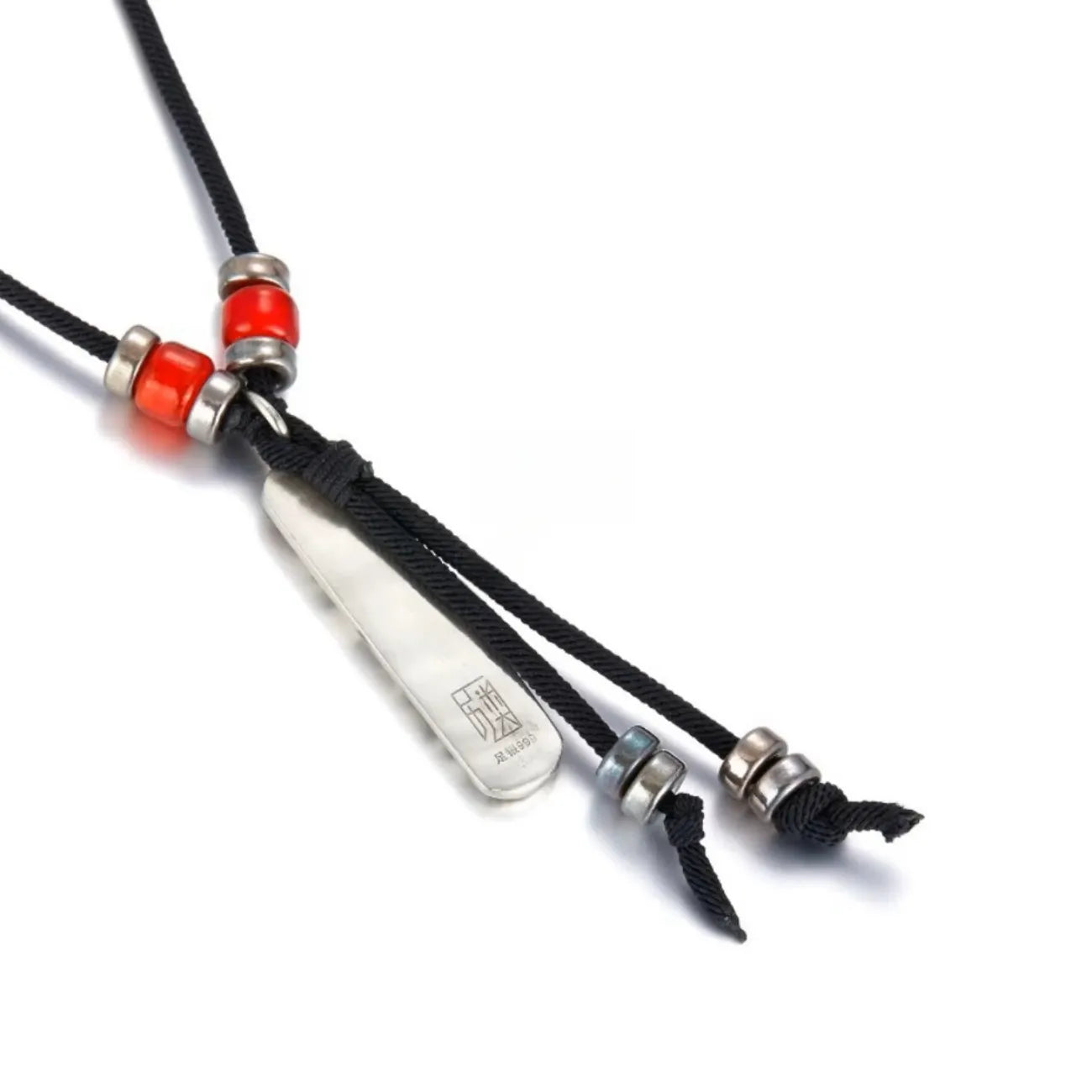 Back view of the silver pendant showing a smooth polished finish with a stamped hallmark/seal