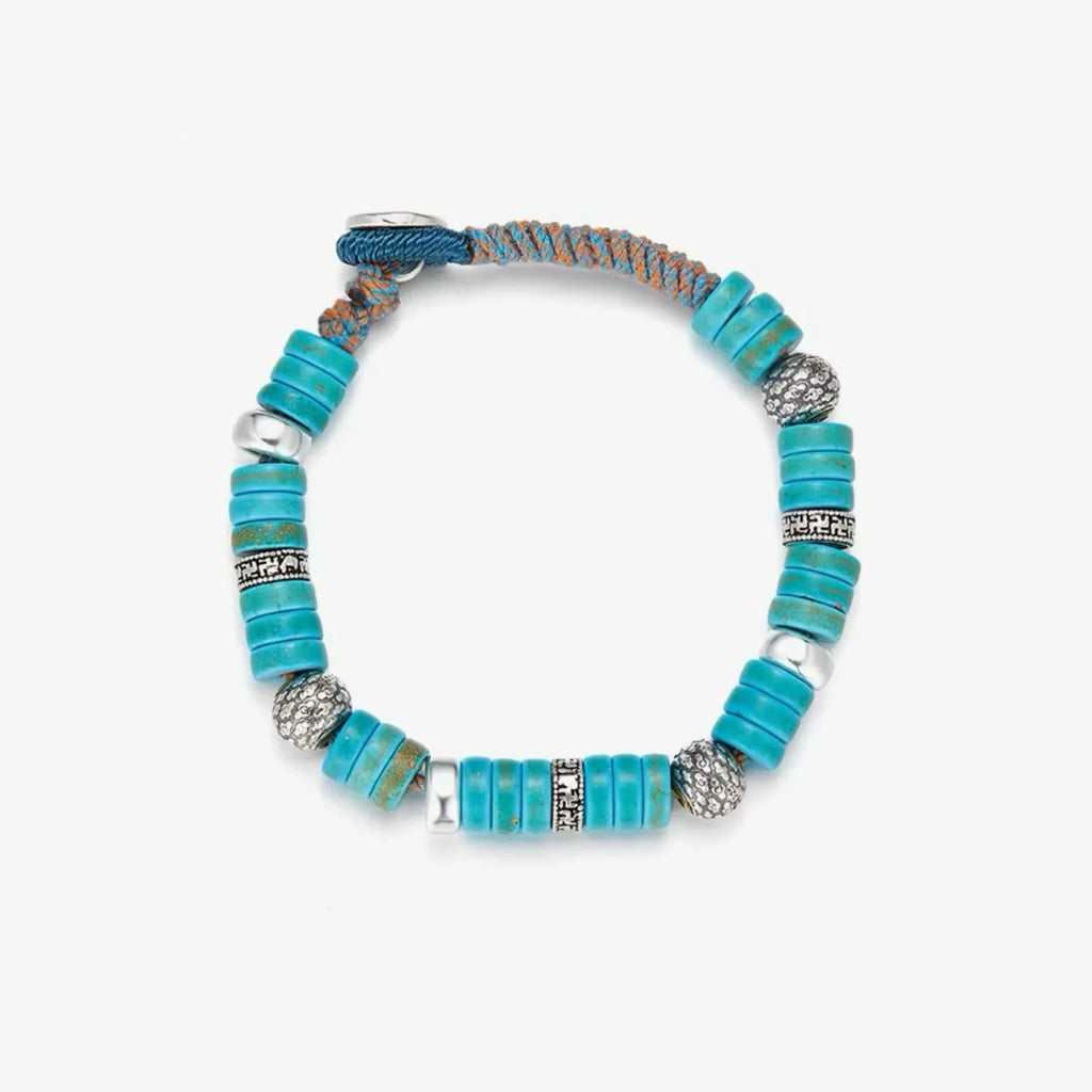 Top-down flatlay displaying the full circle of the bracelet, a perfect blend of boho surfer style and spiritual symbolism