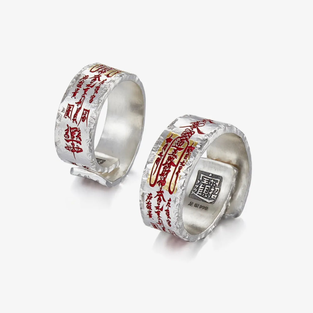Detailed angle view displaying the distressed vintage finish and gold vermilion details of the Taoist ring