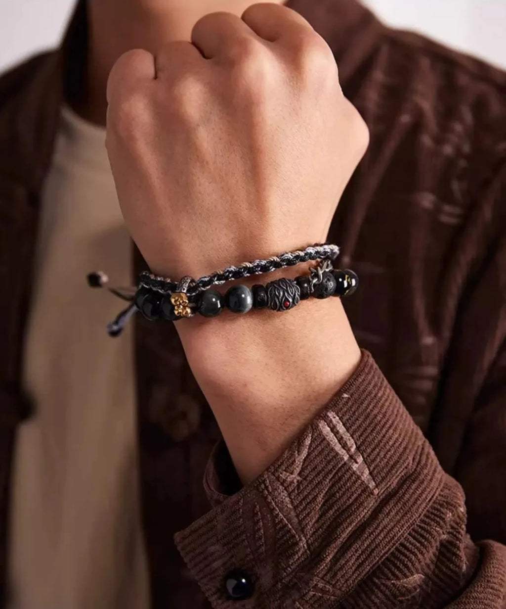 A powerful fist shot highlighting the stacked effect of the bracelet, symbolizing strength and the rebellious spirit of Wukong