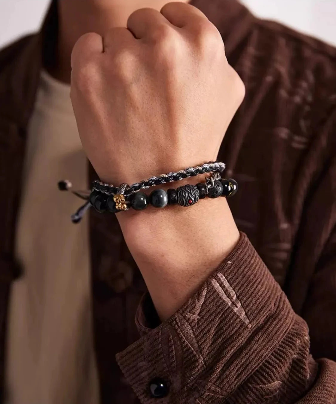 A powerful fist shot highlighting the stacked effect of the bracelet, symbolizing strength and the rebellious spirit of Wukong