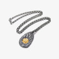 Flat lay of the necklace showing the complete chain and pendant design